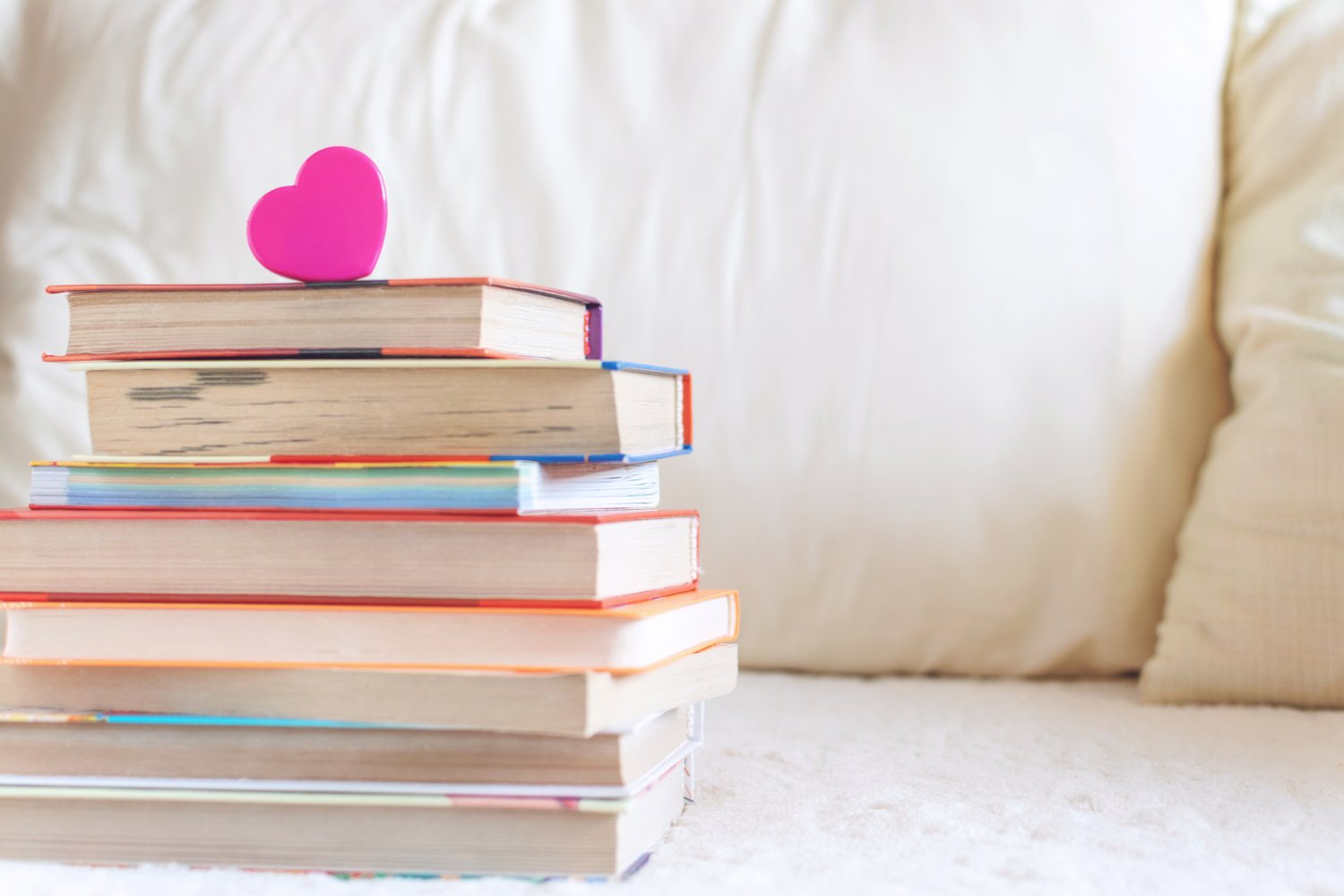 Stack of Books and Pink Heart